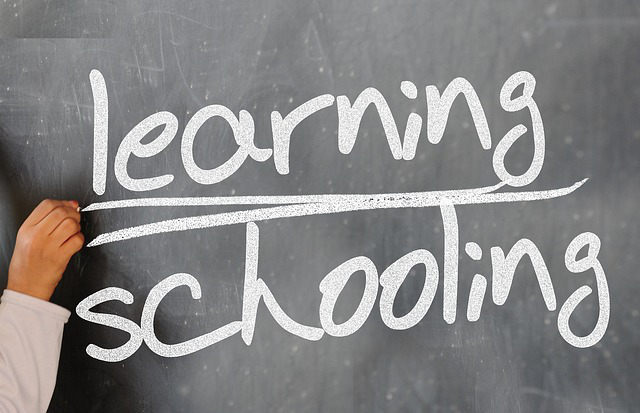 Blackboard with chalk writing on it.