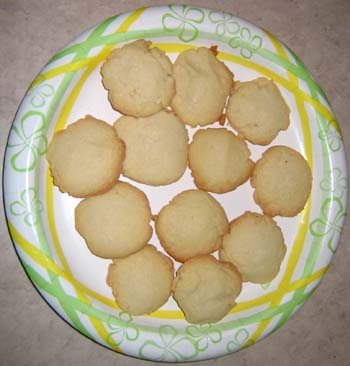 Top view of 12 pieces butter cookies place on a plate.