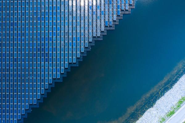 Blue solar panels near ocean