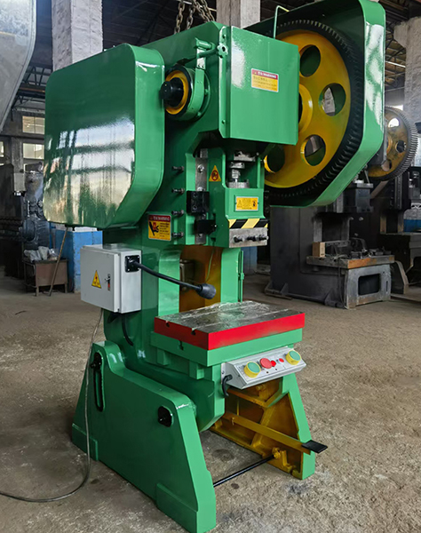 What is the purpose of a power press?
