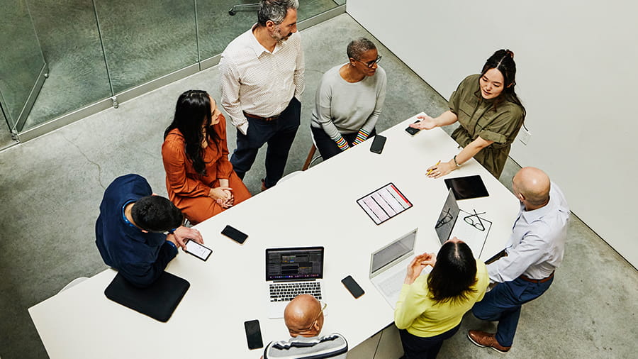 Employees talking in the office