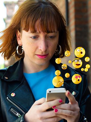 Young woman checking messages on her smartphone.