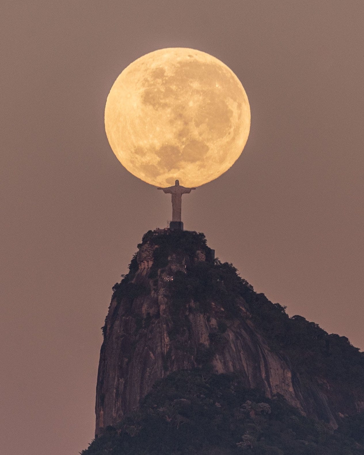 The Mountaintop Christ the Redeemer Statue Cradles the Moon in Rio de ...