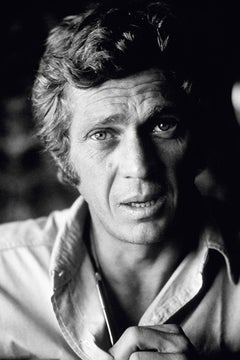 Steve McQueen Sitting On His Desk