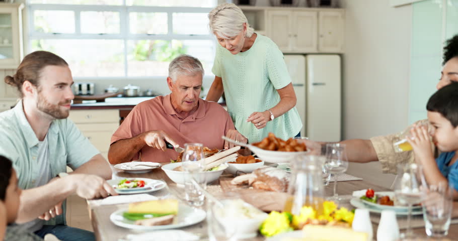 Lunch food, hungry and big family eating meal, giving plates or enjoy chicken protein, turkey or meat at reunion event. Love, kids and home parents, grandparents or people bond, connect and relax