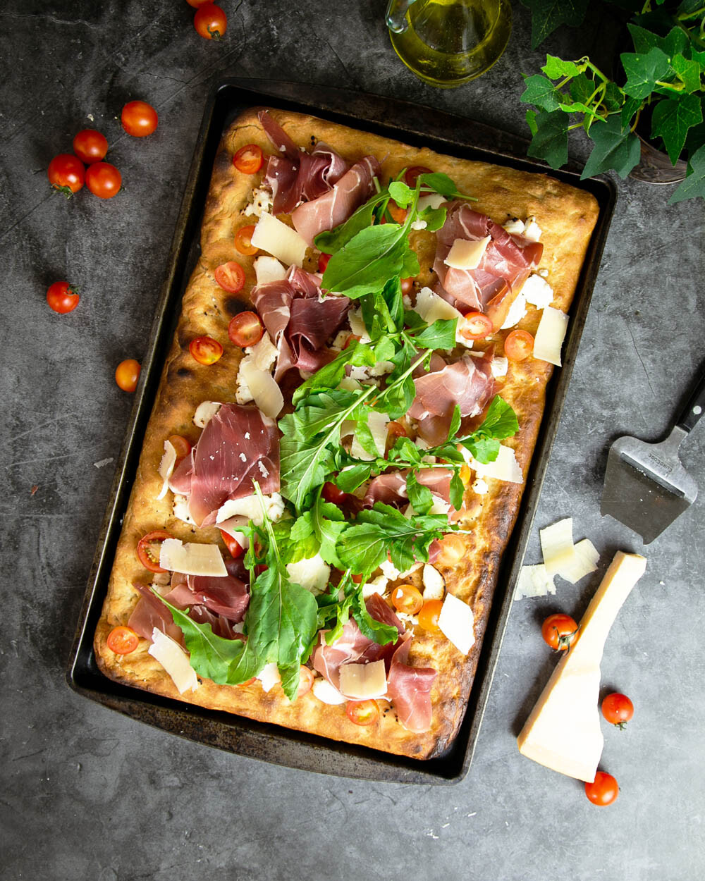 Top view of pizza al taglio with a marble background