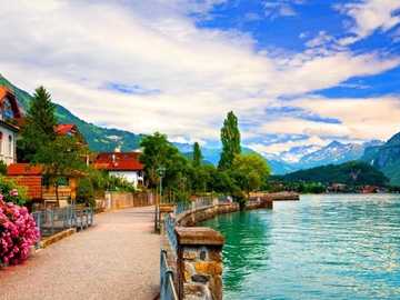 Promenade along the lake in the mountains jigsaw puzzle online