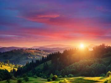 Beautiful green hills glowing by warm sunlight jigsaw puzzle online