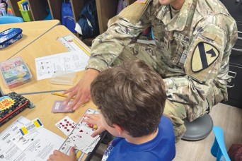 Instilling Army values at The Great Place: DIVARTY bonds with students through Adopt-a-School