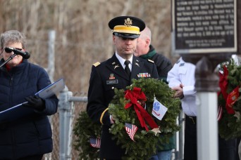 Army Reserve Soldiers lay wreaths for veterans dating back to the Revolutionary War