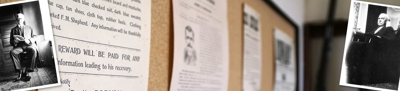 Historic documents and pictures on a display board inside the museum.