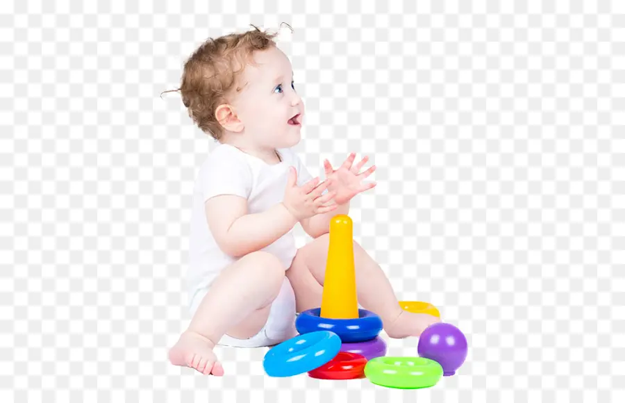 Fröhliches Baby, das mit bunten Spielzeugen spielt