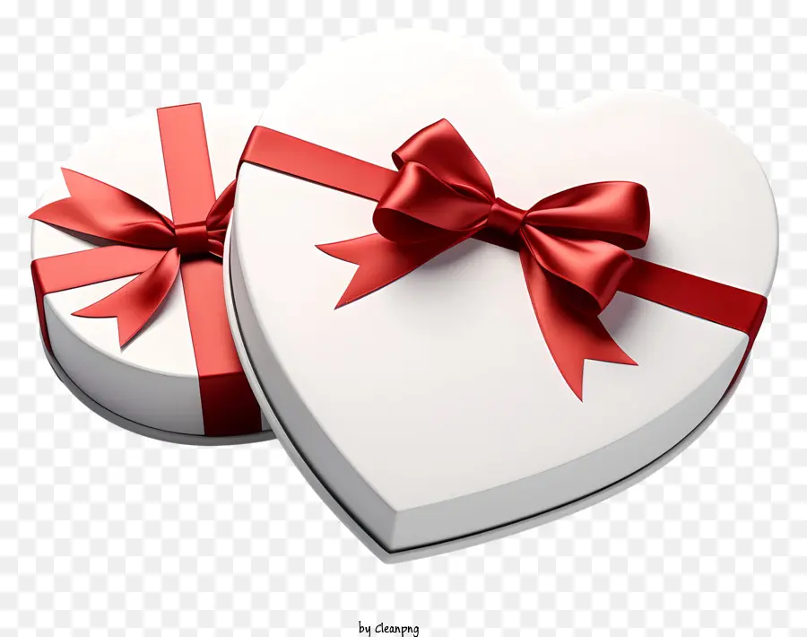 Confezione regalo a forma di cuore con nastro rosso