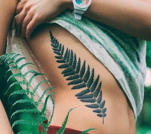 Dark Green Fern on Rib Cage tattoo