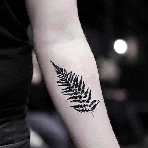 Inner Arm Piece with Dark Fern tattoo