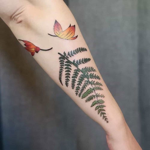 Fern Leaf with Falling Maple Leaves tattoo