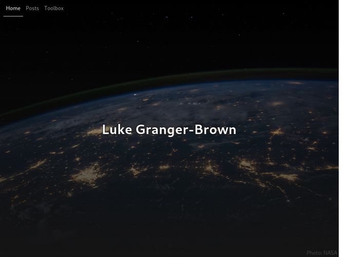 The website screenshot for https://lukegb.com