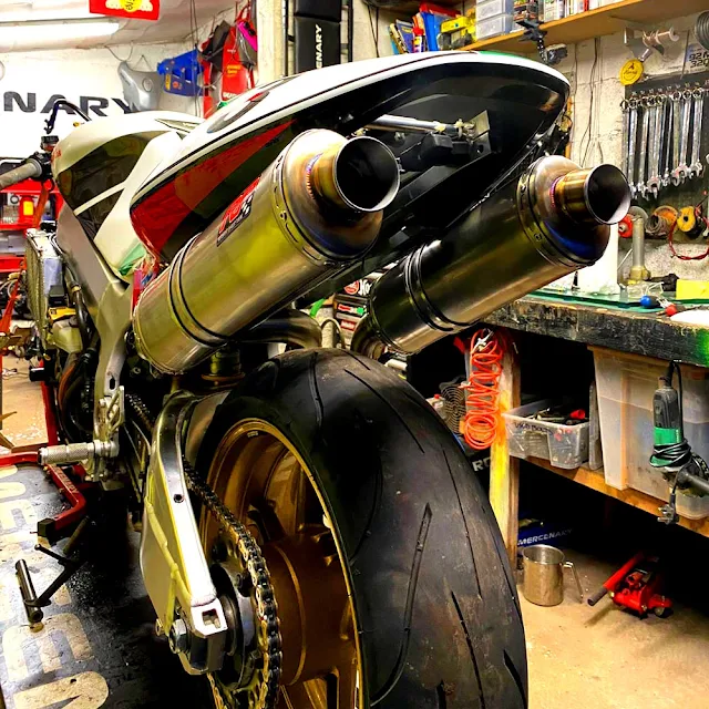 The under-seat exhaust with the bodywork in situ. The under-seat exhaust with the bodywork in situ.