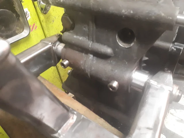 Weird-ass locked-up swingarm pivot arrangement Mercenary Garage Custom Motorcycle Blog Ducati Superlight Superscura Sprint Drag bike Build 110 Stretched Steel 759SS Swingarm