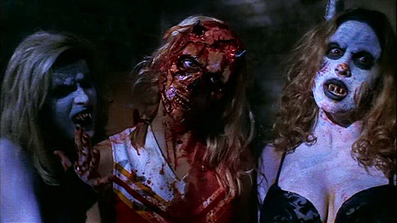 A-demon-with-a-peeled-face-accompanied-by-two-former-weekend-Satanists-in-The-Convent.jpg A cheerleader with a peeled face accompanied by two former weekend Satanists in The Convent (2000)