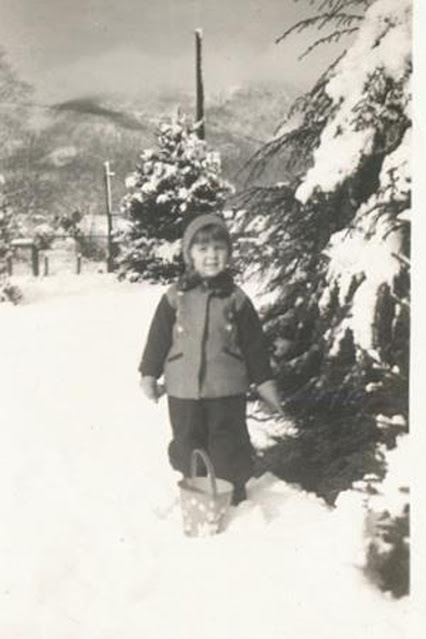 Lil Miss Betsy (in 1945) has loved snow --all of her life, especially at Christmas!