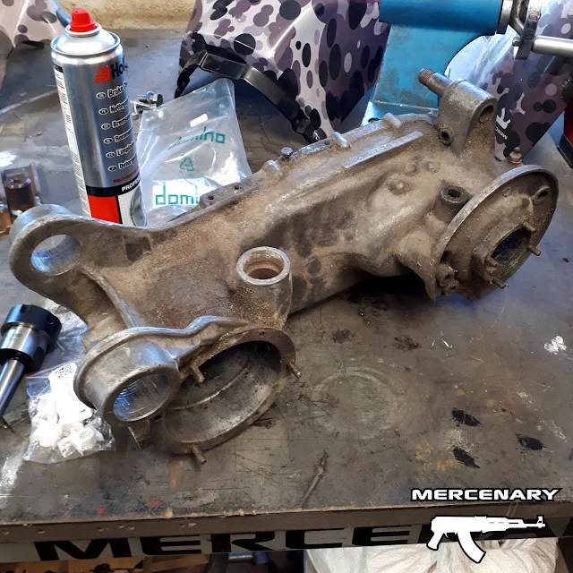 This is what serves as a crankcase on a scooter. The big roundy bit at the front is where the crank goes. The big roundy bit at the back is the brake hub. I'm pretty sure the horizontal hole is for carrying a refreshing non-alcoholic beverage. This is what serves as a crankcase on a scooter. The big roundy bit at the front is where the crank goes. The big roundy bit at the back is the brake hub. I'm pretty sure the horizontal hole is for carrying a refreshing non-alcoholic beverage.