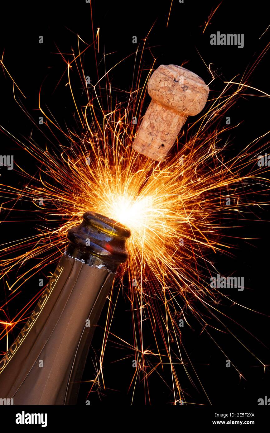 Popping champagne cork Stock Photo