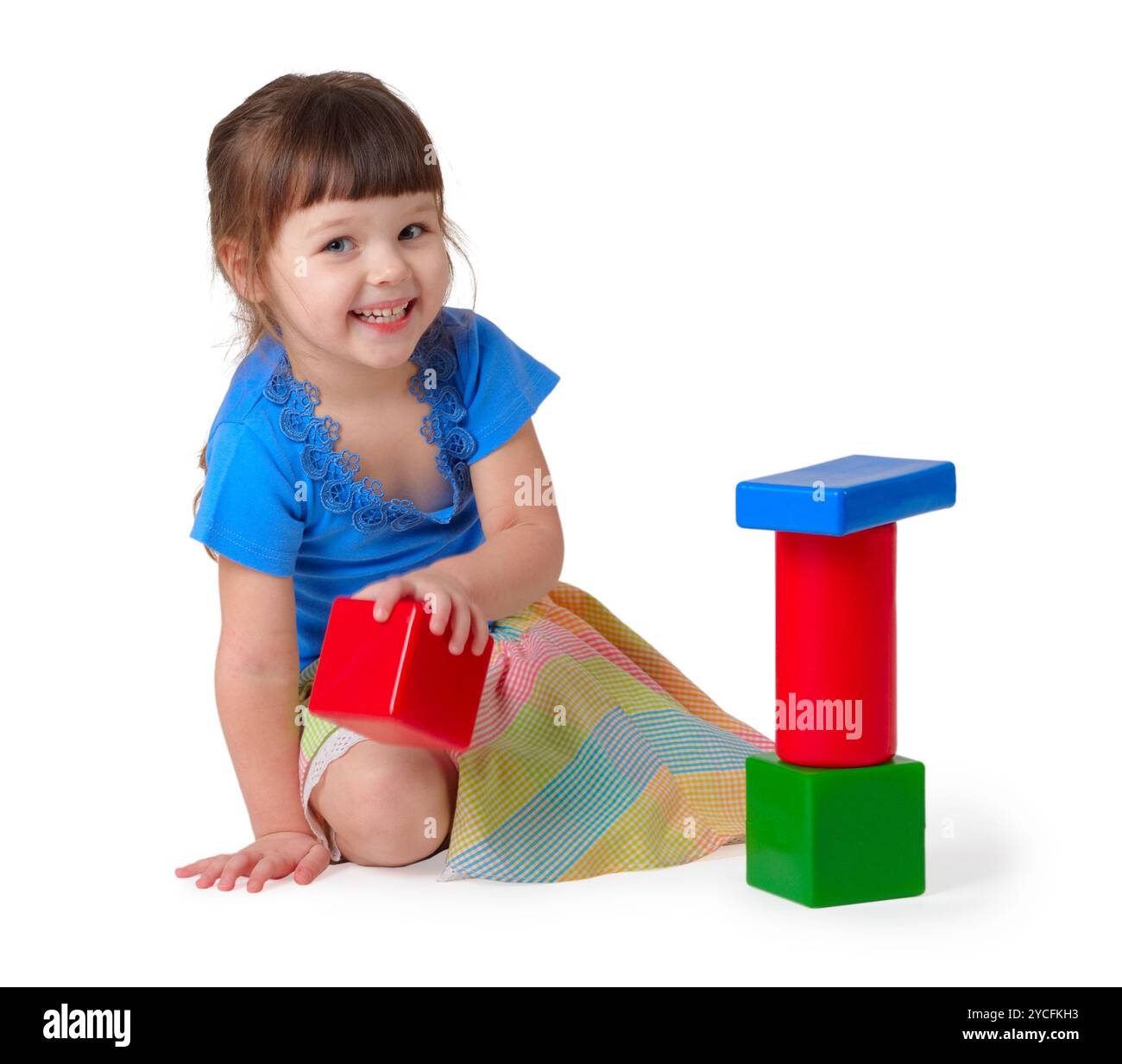 Girl playing with toys Stock Photo