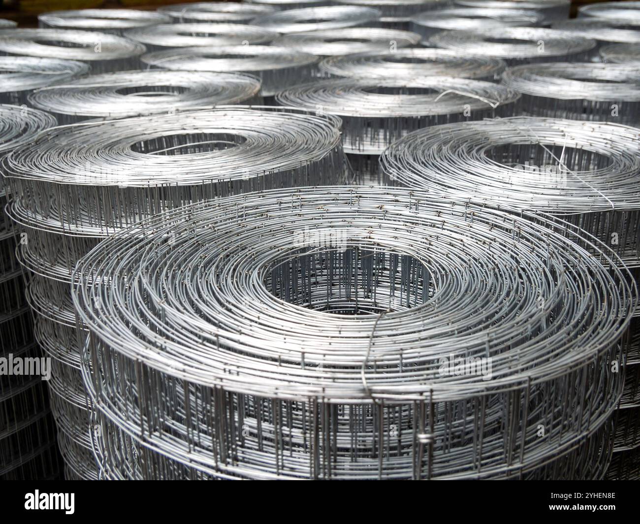 Metal mesh wound in rolls Stock Photo