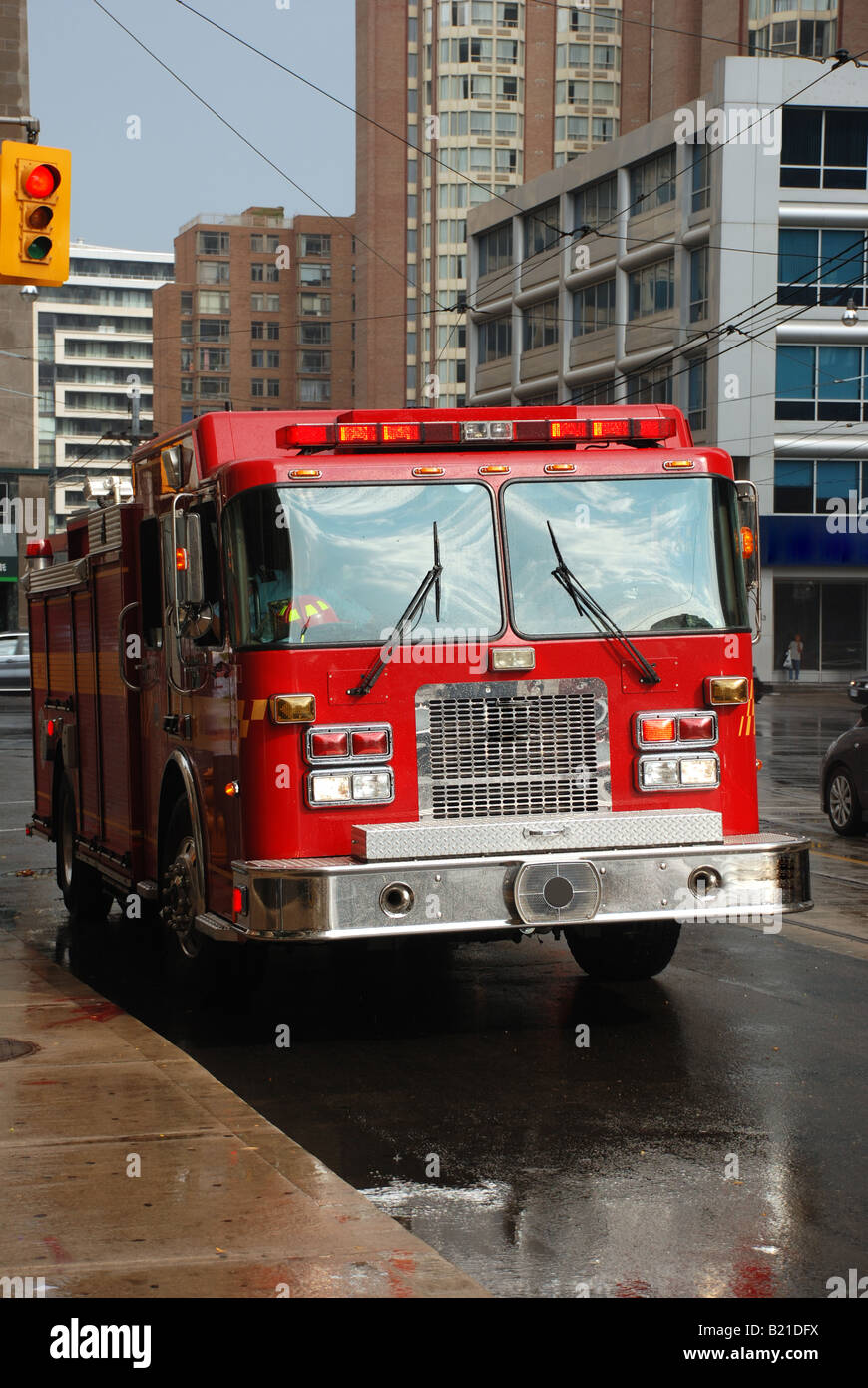 Fire truck on a city street Stock Photo