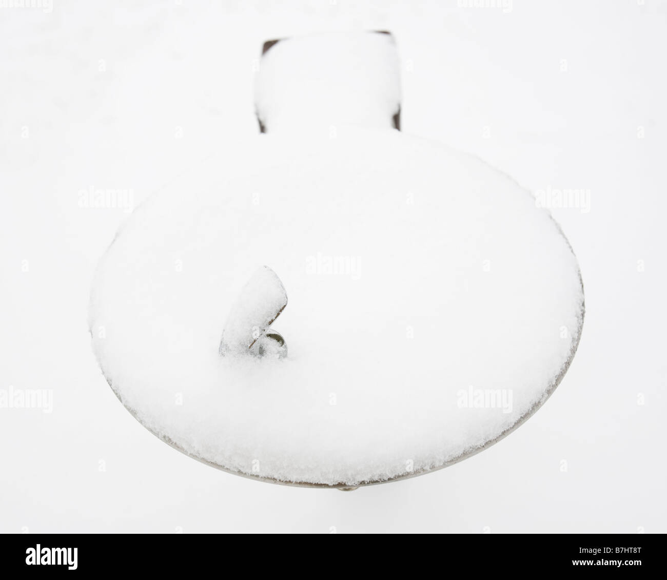 Snow covered drinking fountain Stock Photo