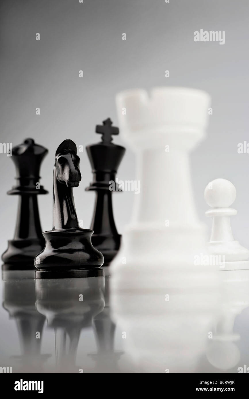 chess pieces face off Stock Photo