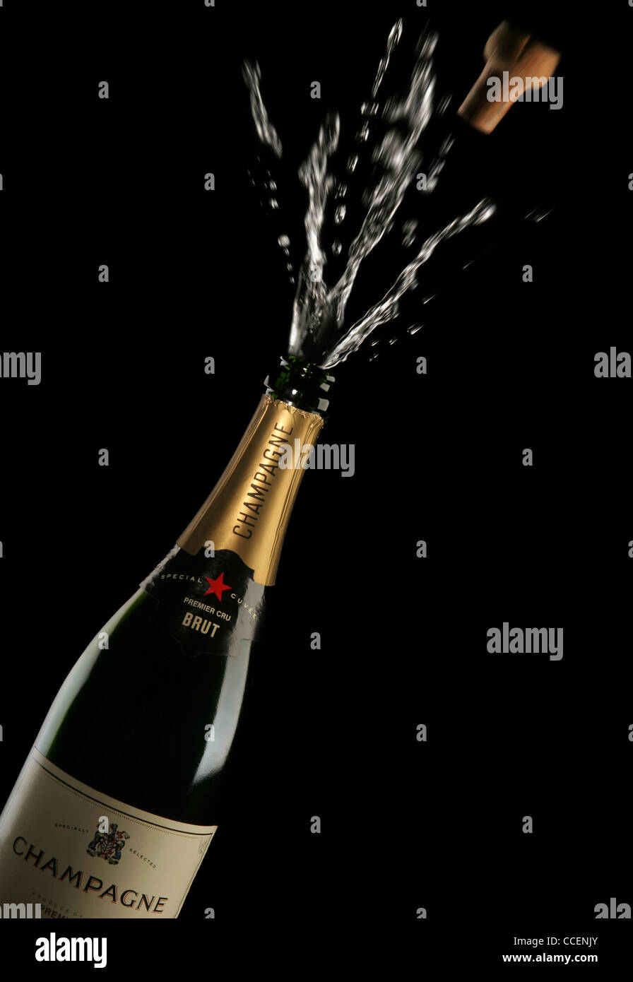 Opening a Champagne Bottle Stock Photo