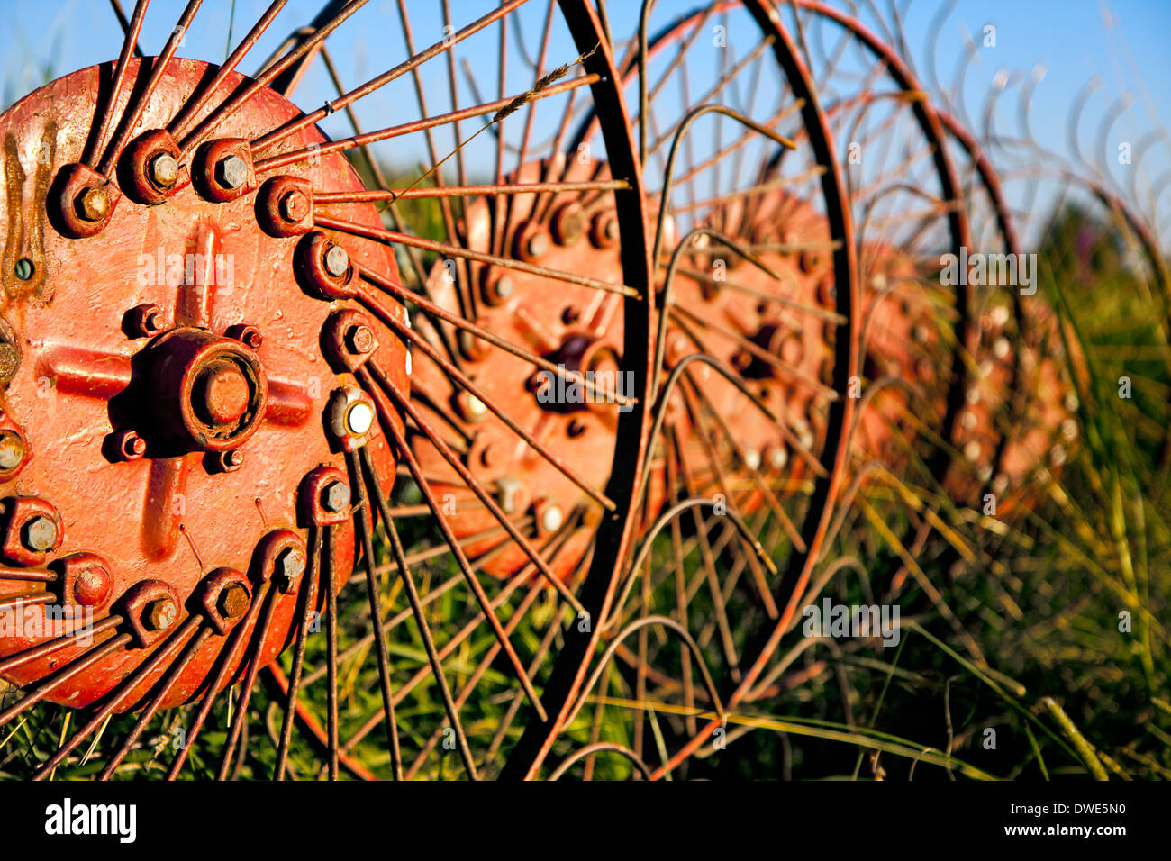 Hay tedder - red rake wheels Stock Photo