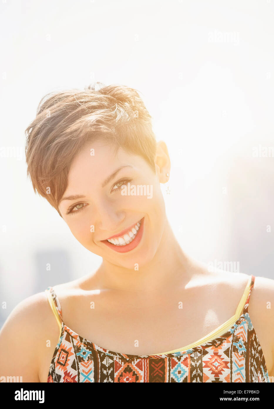 Portrait of smiling brunette Stock Photo