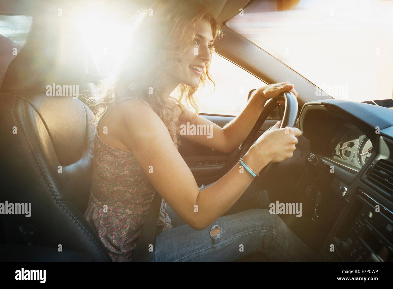 Young woman driving car Stock Photo