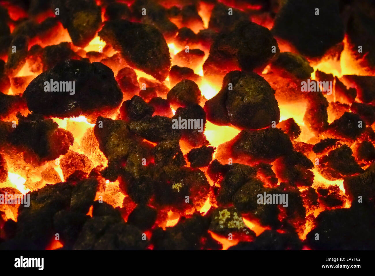 glowing coal in a fire bowl Stock Photo