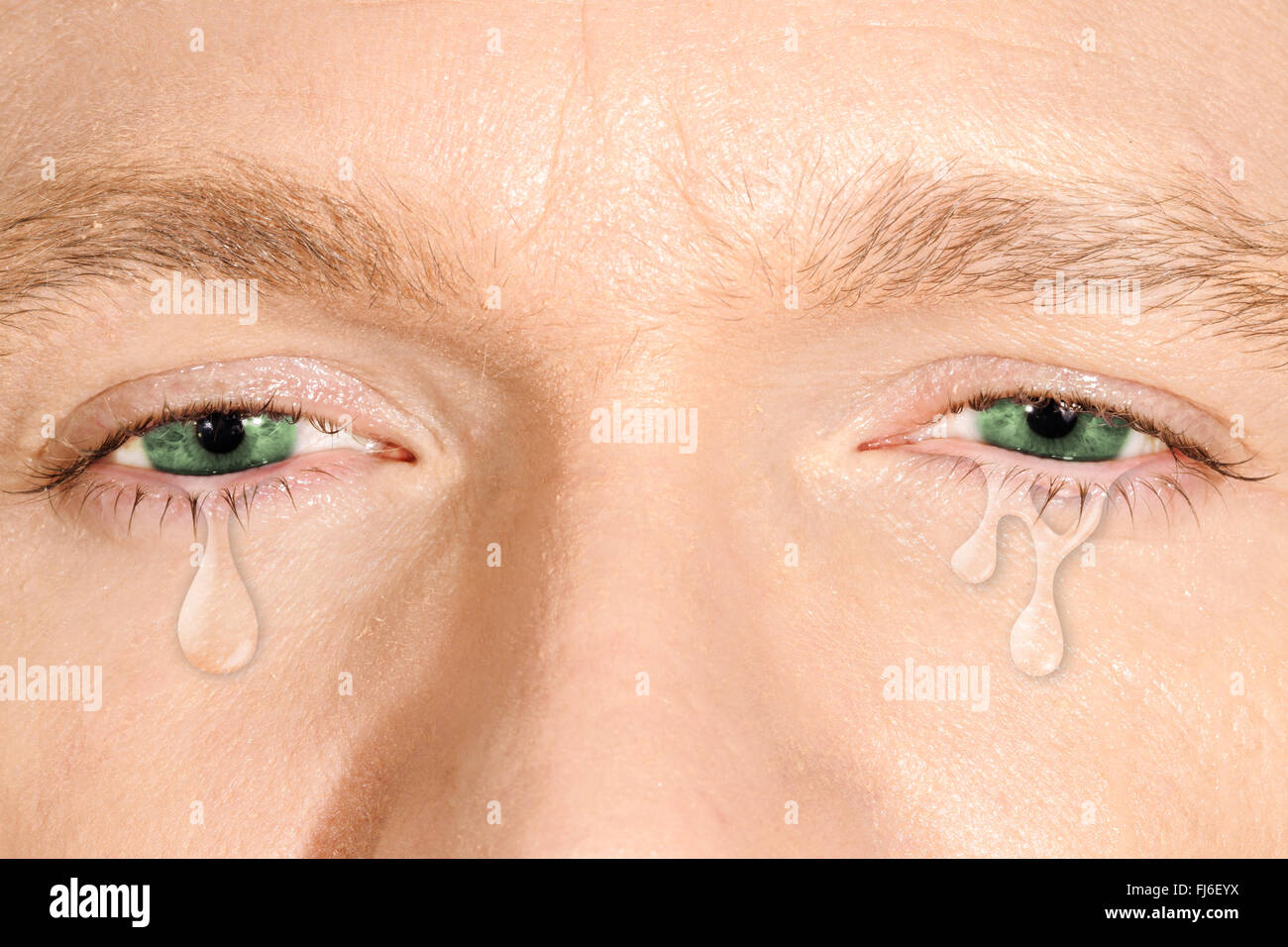 Crying green eyes Stock Photo