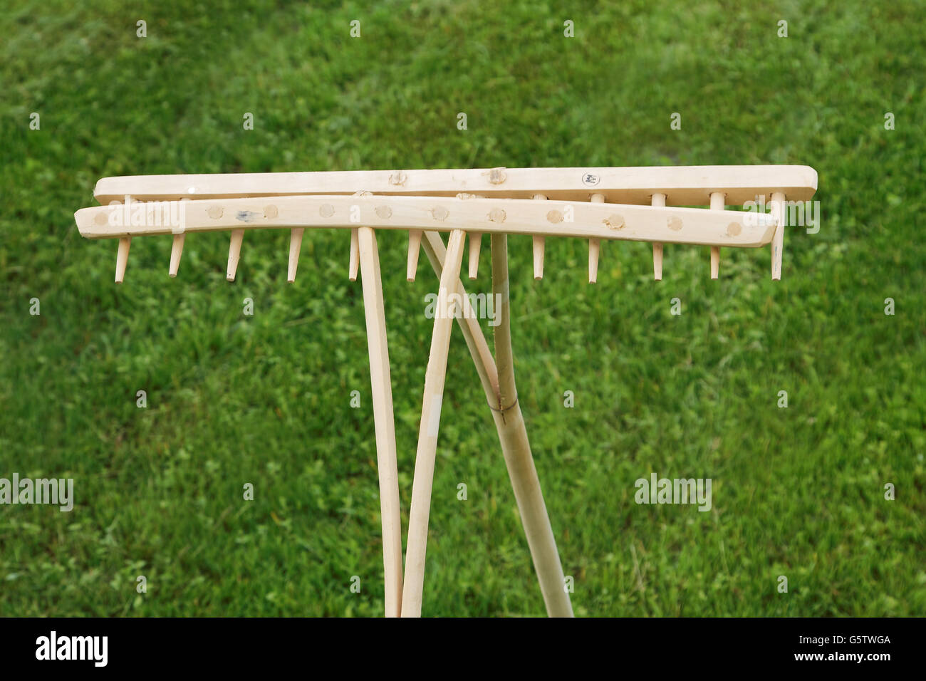 vRetro Wooden Rake Handmade Stock Photo