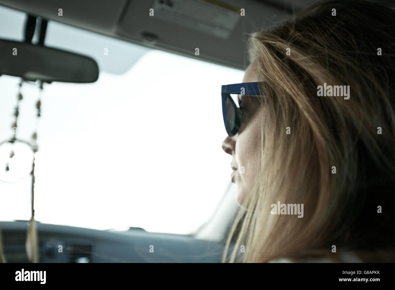 Woman driving car Stock Photo