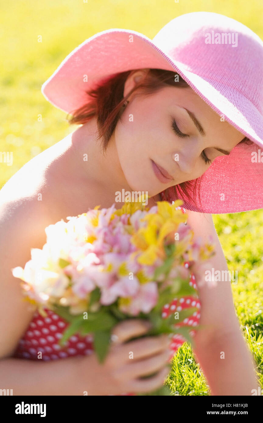 woman holding flowers Stock Photo