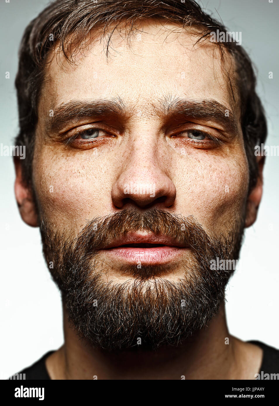 The sad man and face closeup Stock Photo