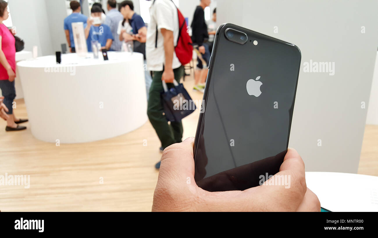 BANGKOK, THAILAND - NOVEMBER 11, 2017: iPhone 8 Plus is showing at iStudio Shop CentralWorld Shopping Mall for a customer to test the new iPhone using Stock Photo