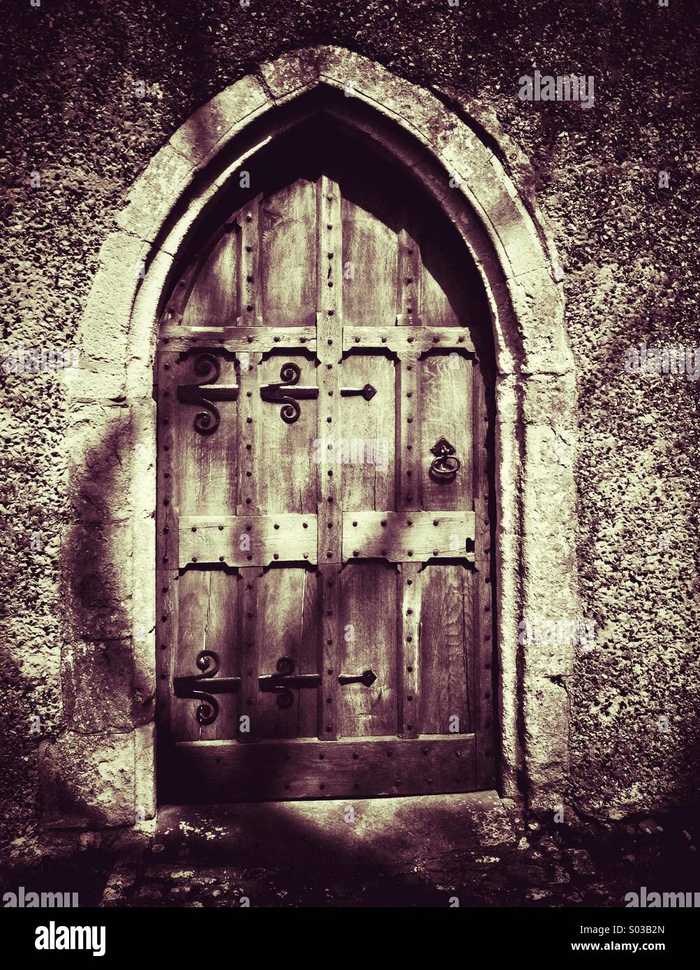 Creepy church door Stock Photo