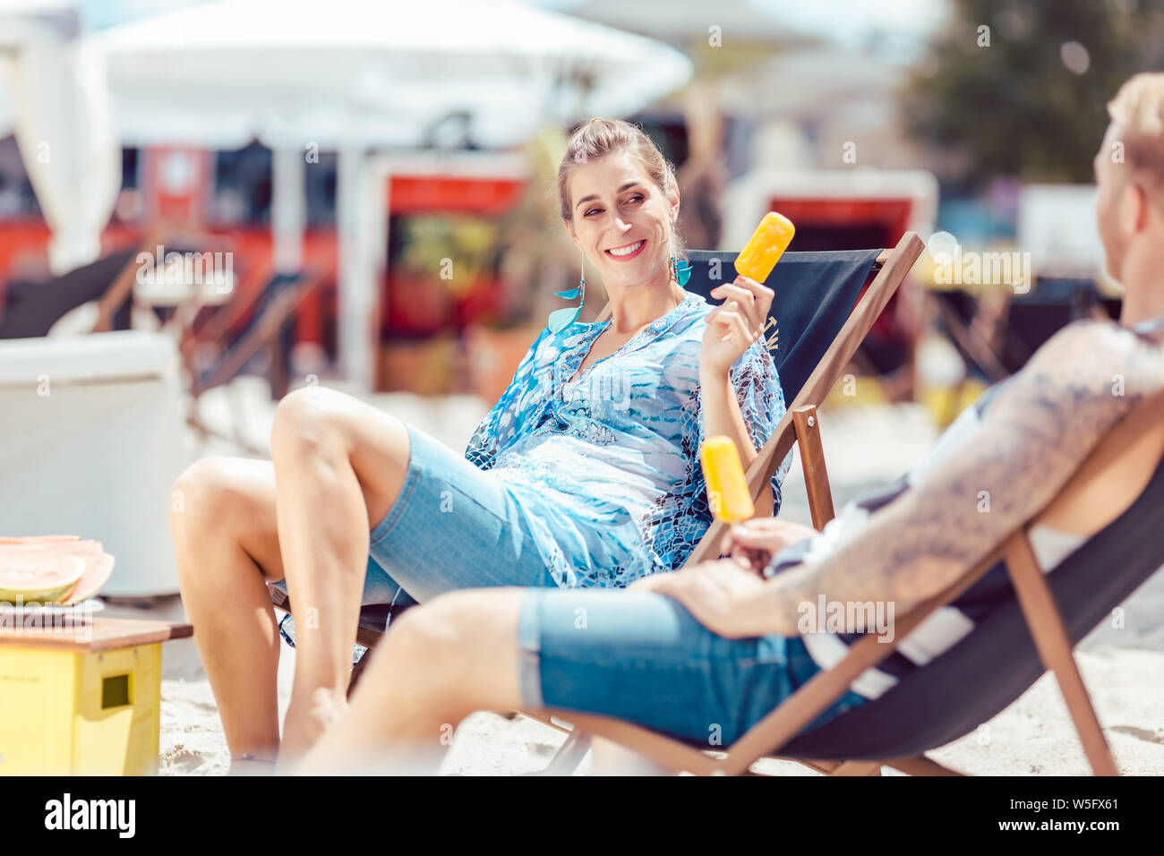 Young couple enjoying popsicle Stock Photo