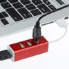 a red usb plugged into a laptop