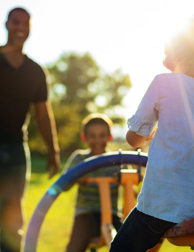 A happy family in sunshine.