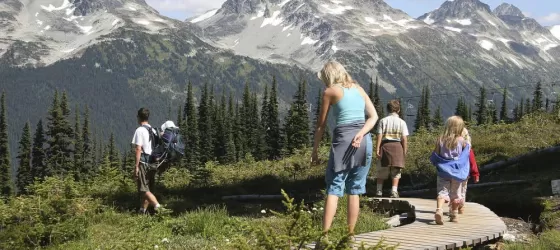 Family hiking on a tour of Alaska