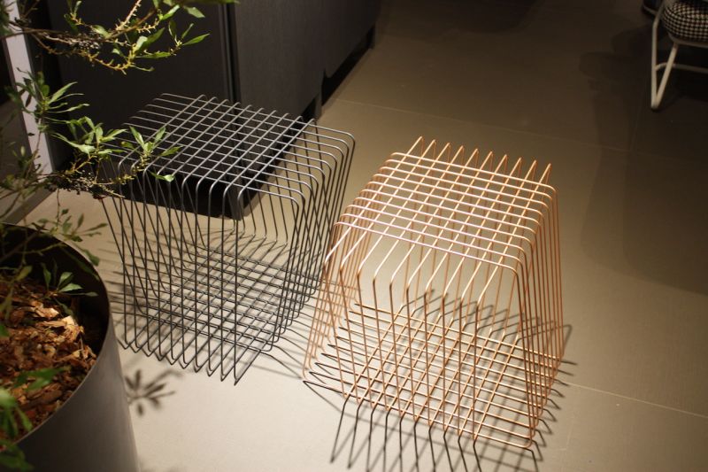 Not quite square, these wire side tables from Bonaldo cast an interesting shadow. The lacquered wire design is also great for an area where you want to keep the decor light and airy. It also comes in five vibrant colors.