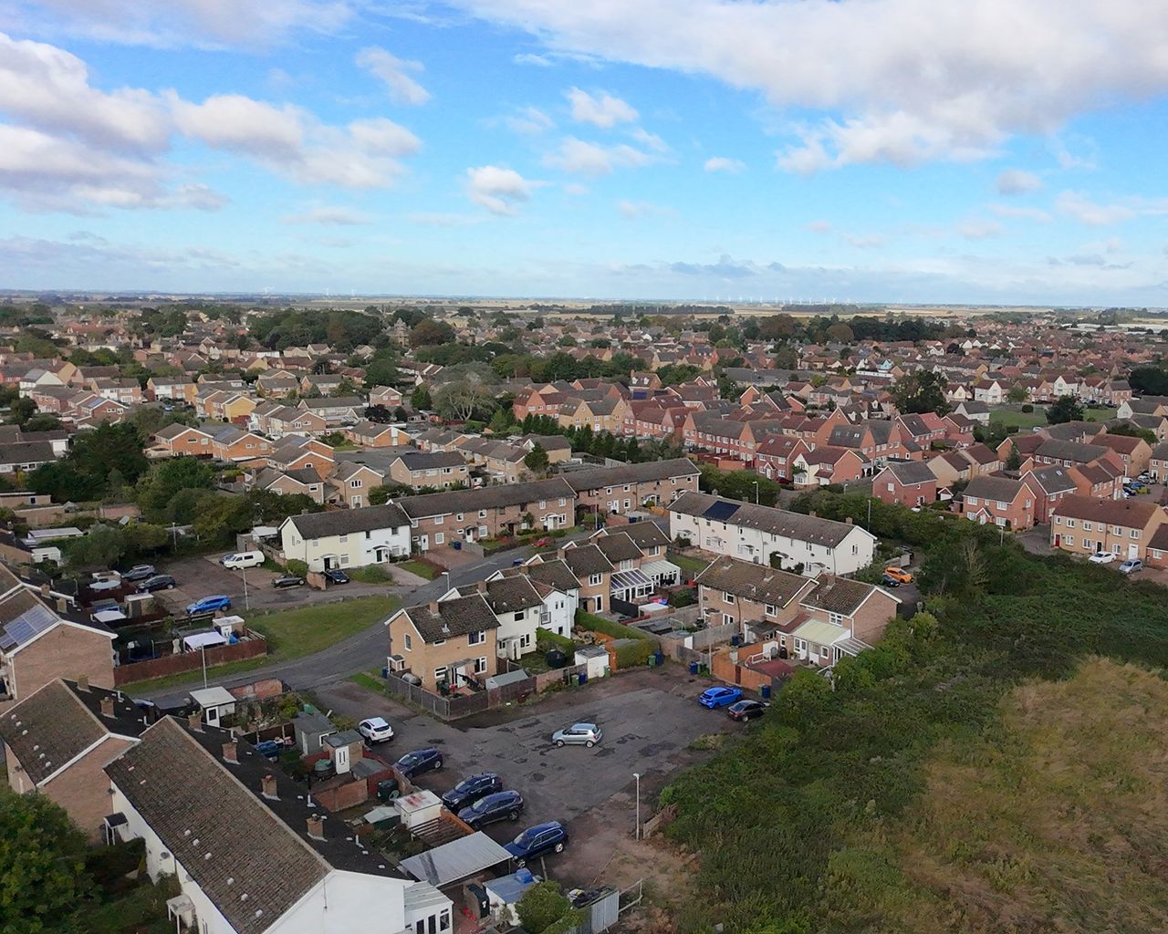Photo of houses taken with the DJI Neo
